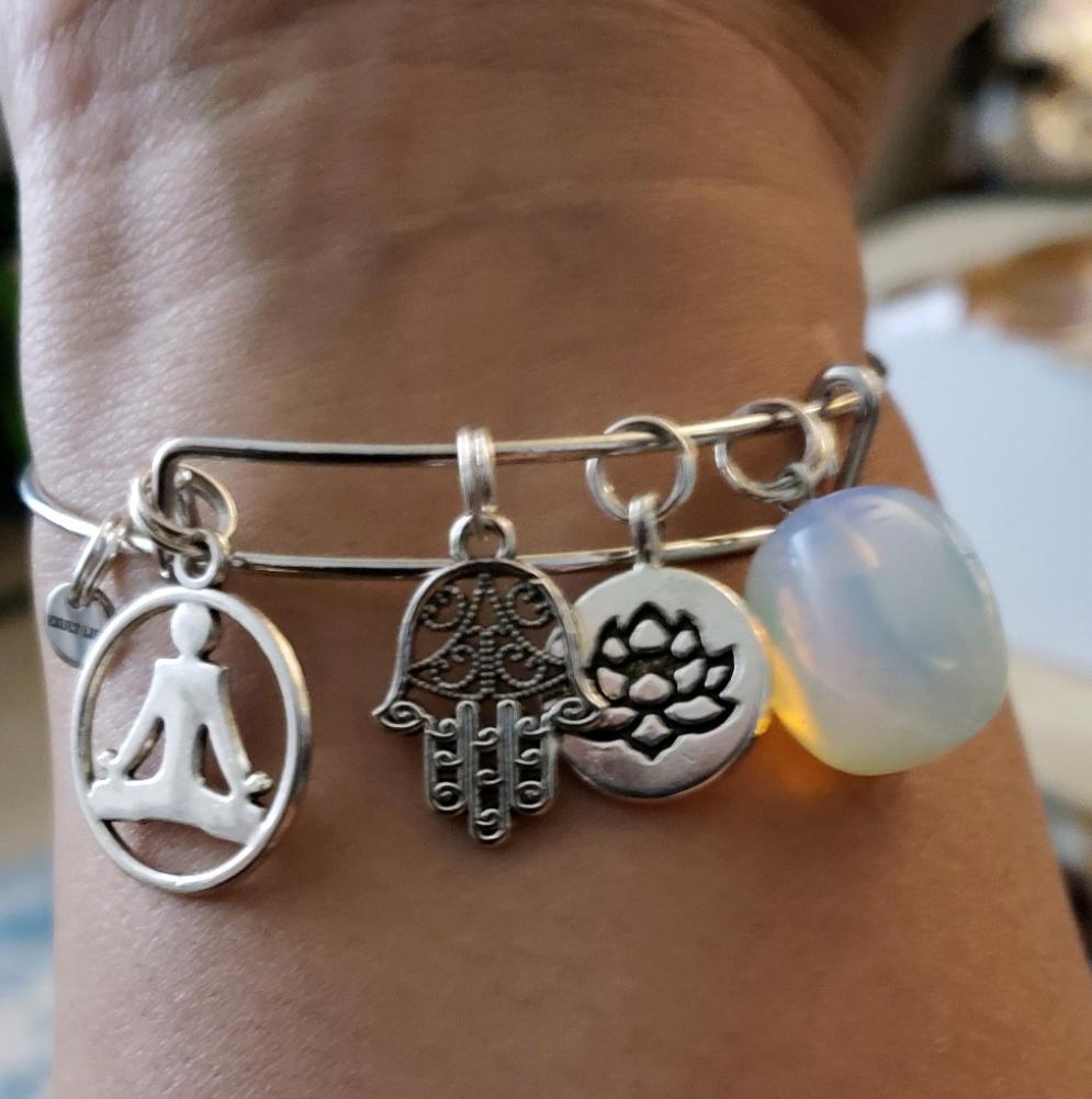 This bangle is handcrafted with Sea Opal collected from the Ocean.