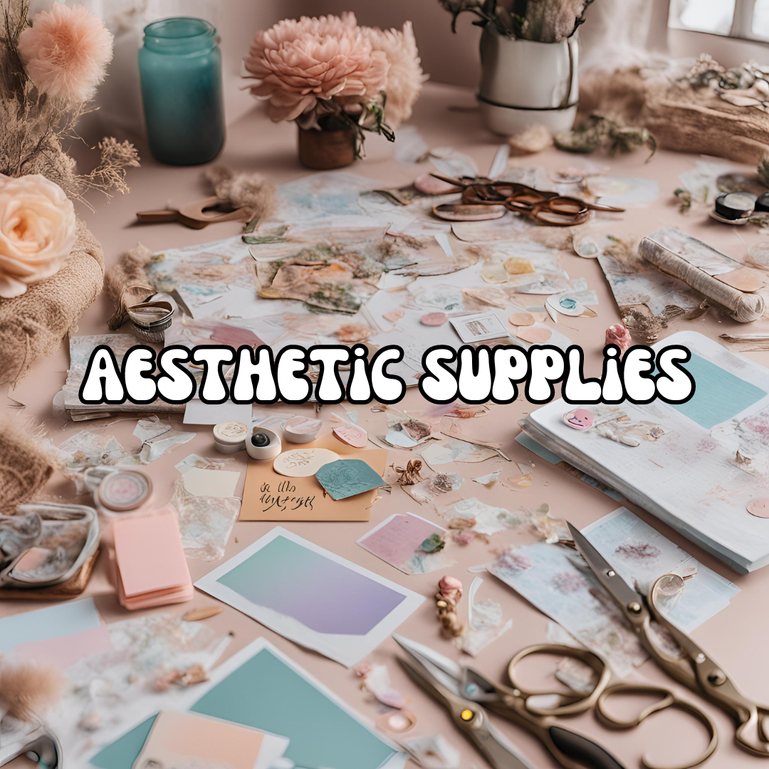 A variety of aesthetic supplies including stickers, cards, printables, and more spread out on a table, ready for participants to use in crafting their vision boards.